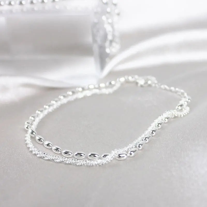 Ensemble de bracelets élégants en argent avec des pierres de zirconium
