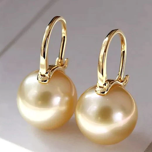 Boucles d'oreilles élégantes en or avec perles