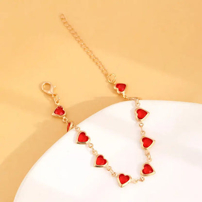 Bracelet cœur en rubis doré
