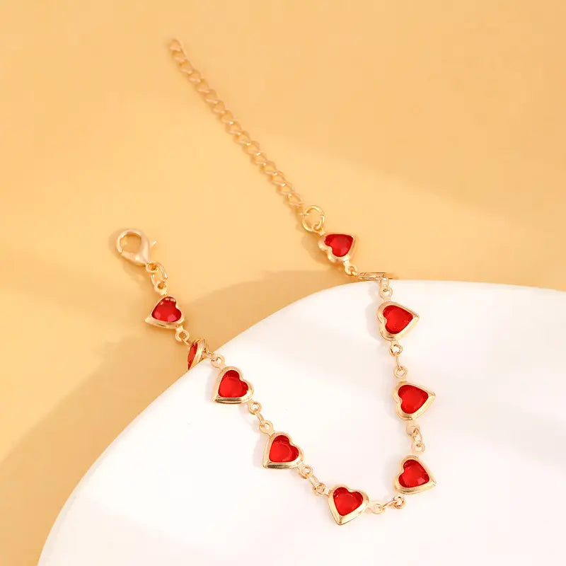 Bracelet cœur en rubis doré