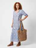 Ottoline™ | Vestido Midi Estampado con Cuello Anudado y Pompones