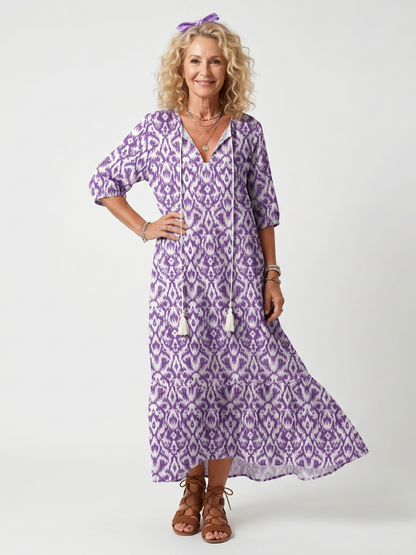 Penelope™ | Vestido Midi Estampado con Nudo y Pompones