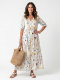 Sylvie™ | Vestido Midi Botánico con Nudo y Pompones