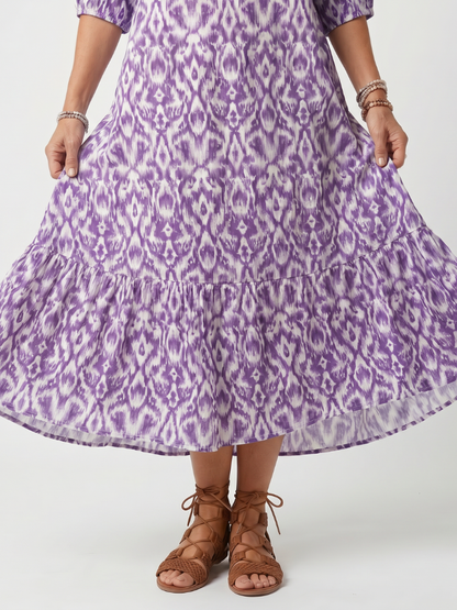 Penelope™ | Vestido Midi Estampado con Nudo y Pompones