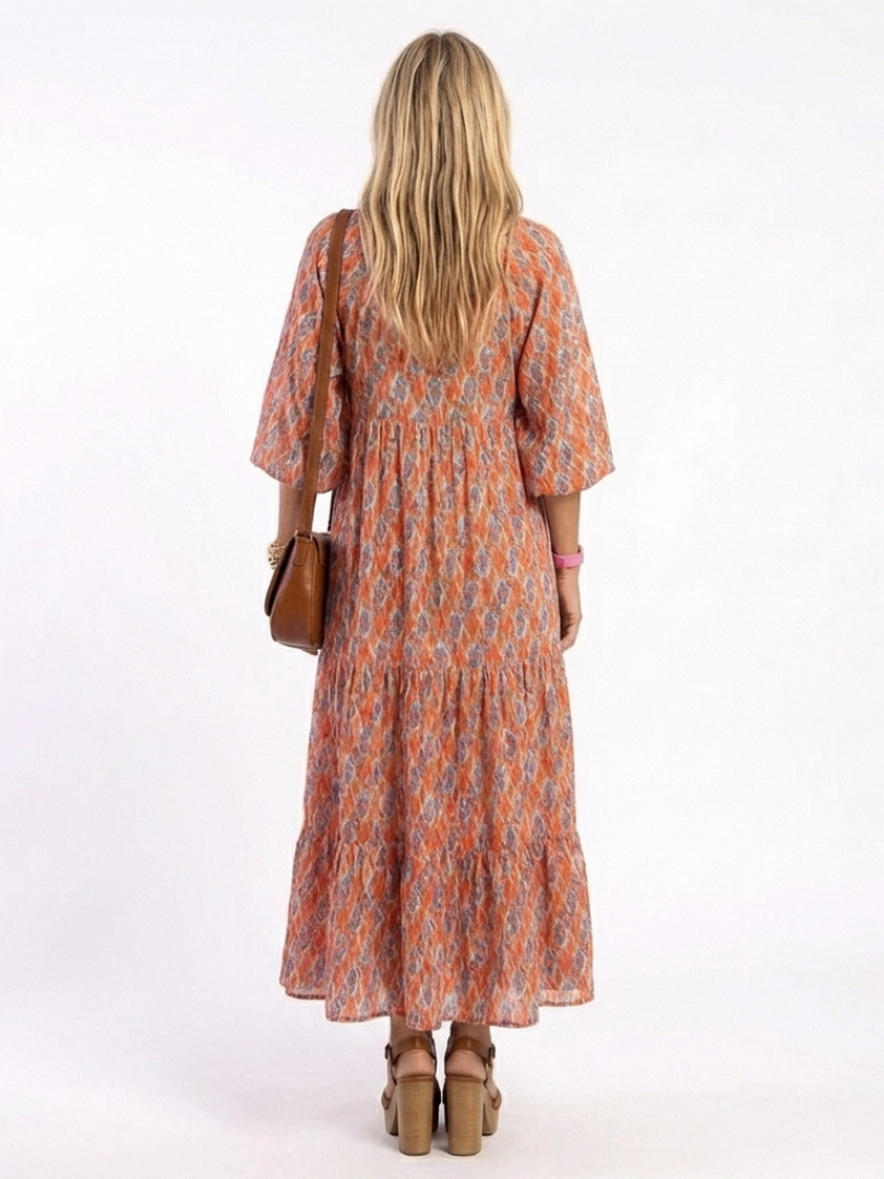Amara™ | Vestido Midi Geométrico con Cuello en V y Volantes