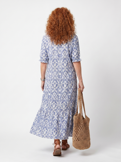Ottoline™ | Vestido Midi Estampado con Cuello Anudado y Pompones