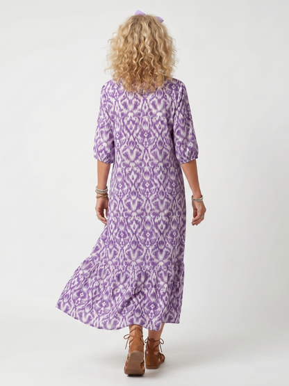 Penelope™ | Vestido Midi Estampado con Nudo y Pompones