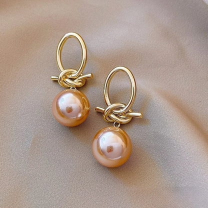 Boucles d'oreilles pendantes avec perle intemporelle
