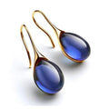 Boucles d'oreilles pendantes chics avec cristaux