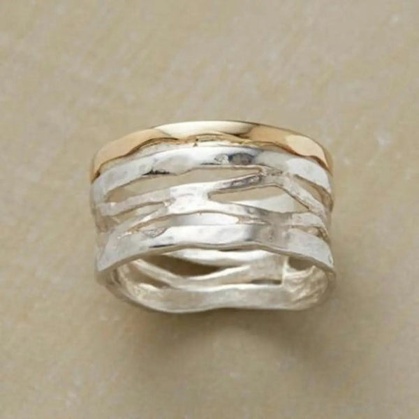 Anillo vintage perforado en oro y plata