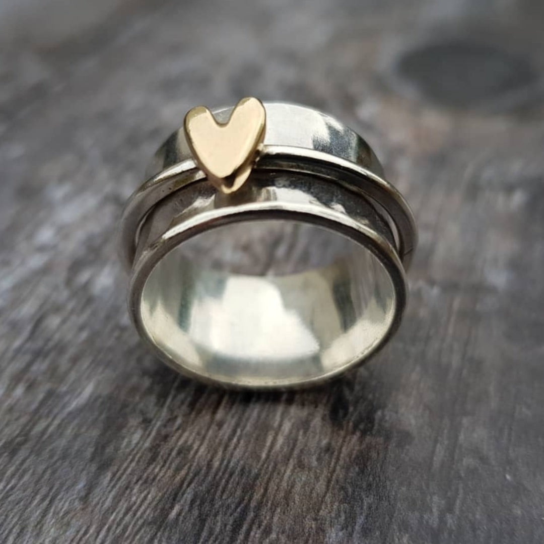 Bague en argent avec cœur en or