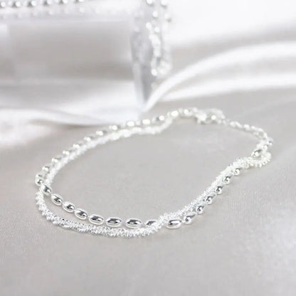 Ensemble de bracelets élégants en argent avec des pierres de zirconium