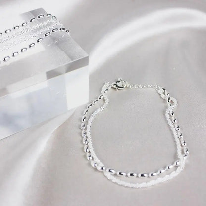 Ensemble de bracelets élégants en argent avec des pierres de zirconium