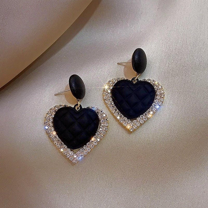 Boucles d'oreilles en cœur noir en or