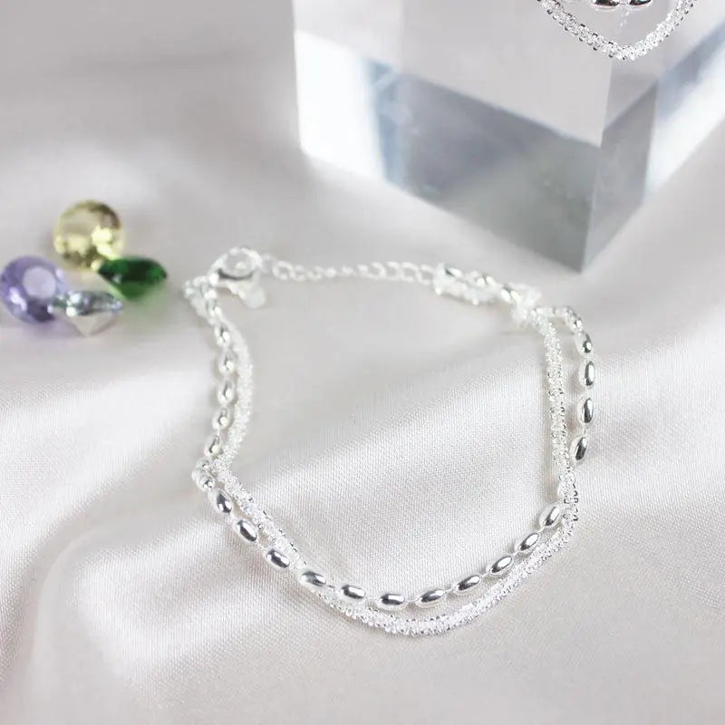 Ensemble de bracelets élégants en argent avec des pierres de zirconium