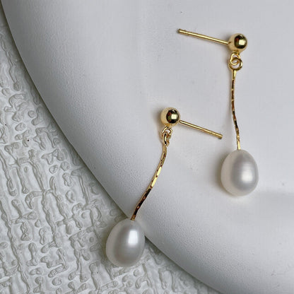 Boucles d'oreilles avec Perle Élégante
