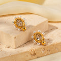 Boucles d'Oreilles Sophistiquées en Or avec Perle
