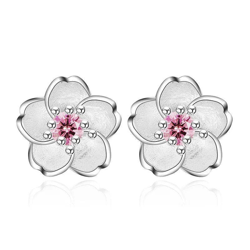 Boucles d'oreilles à bouton en forme de fleur avec zirconiums
