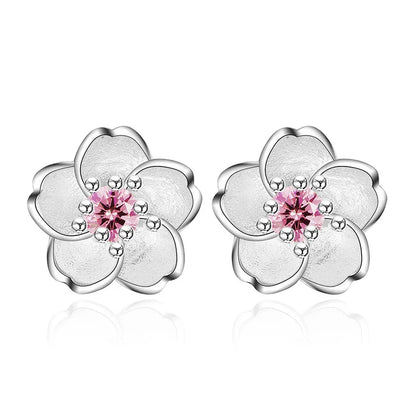 Boucles d'oreilles à bouton en forme de fleur avec zirconiums