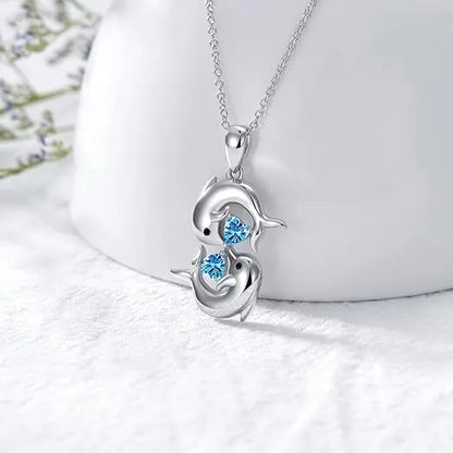 Collier en Argent avec Doubles Dauphins et Cristal Bleu