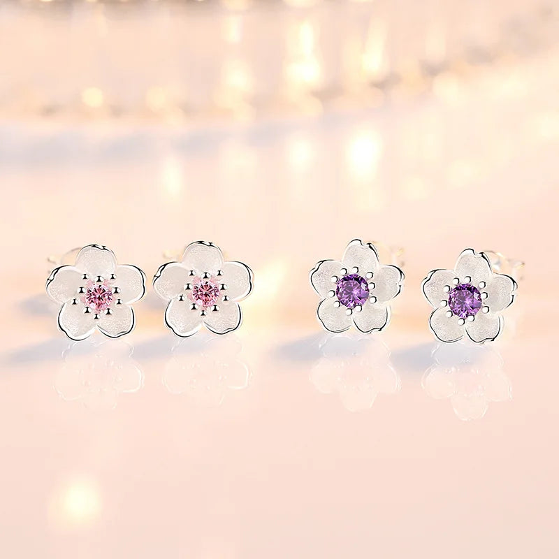 Boucles d'oreilles à bouton en forme de fleur avec zirconiums