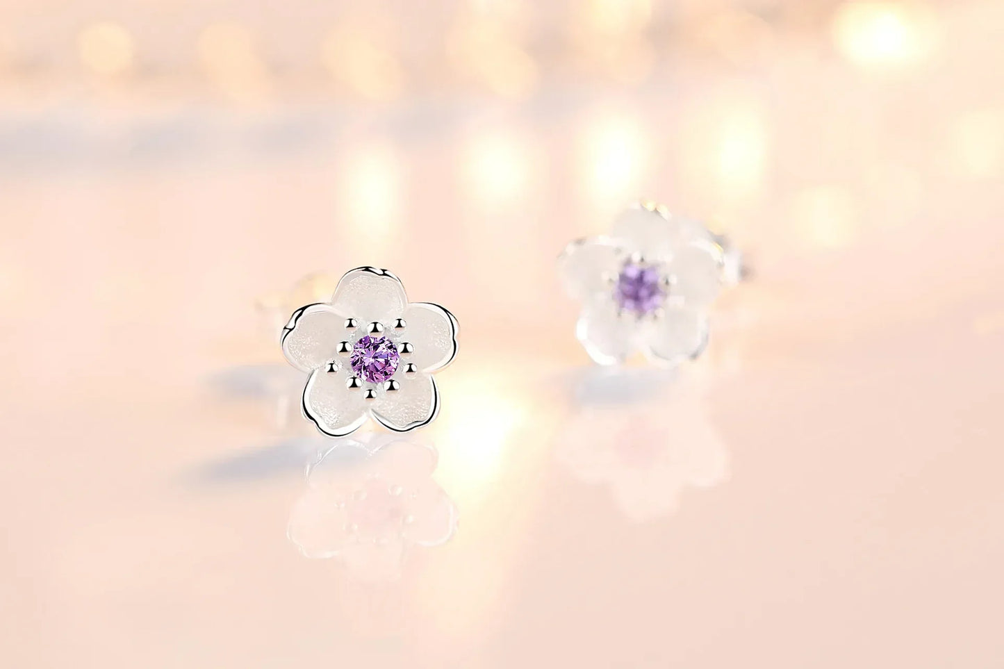 Boucles d'oreilles à bouton en forme de fleur avec zirconiums