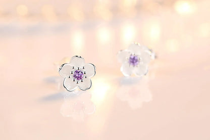 Boucles d'oreilles à bouton en forme de fleur avec zirconiums