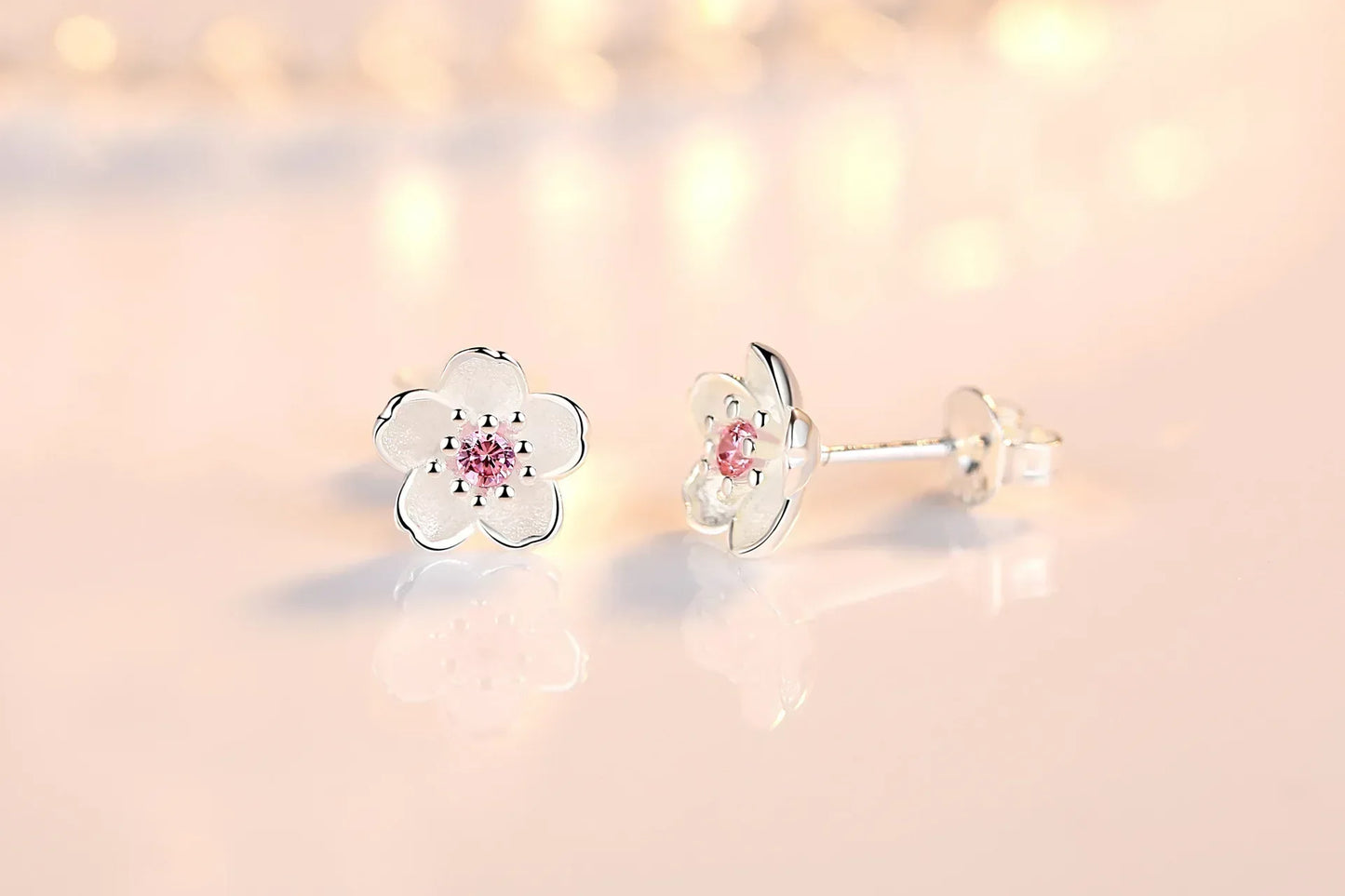 Boucles d'oreilles à bouton en forme de fleur avec zirconiums