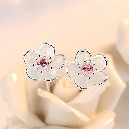 Boucles d'oreilles à bouton en forme de fleur avec zirconiums