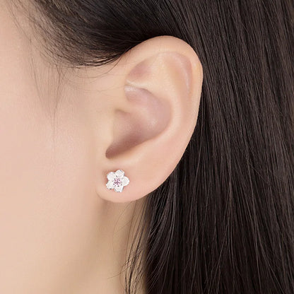 Boucles d'oreilles à bouton en forme de fleur avec zirconiums