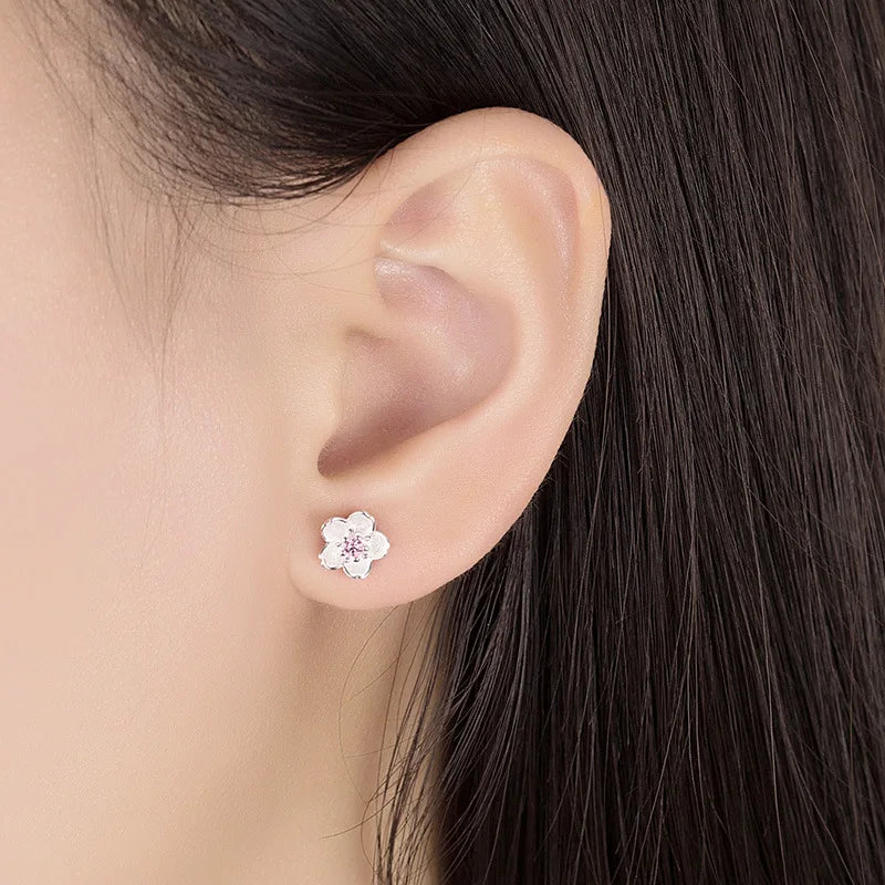 Boucles d'oreilles à bouton en forme de fleur avec zirconiums