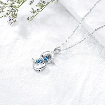 Collier en Argent avec Doubles Dauphins et Cristal Bleu