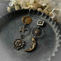 Boucles d'Oreilles Pendantes avec Pendentif Soleil et Lune